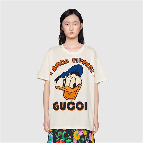 gucci donald duck fake t shirt|donald duck gucci cap.